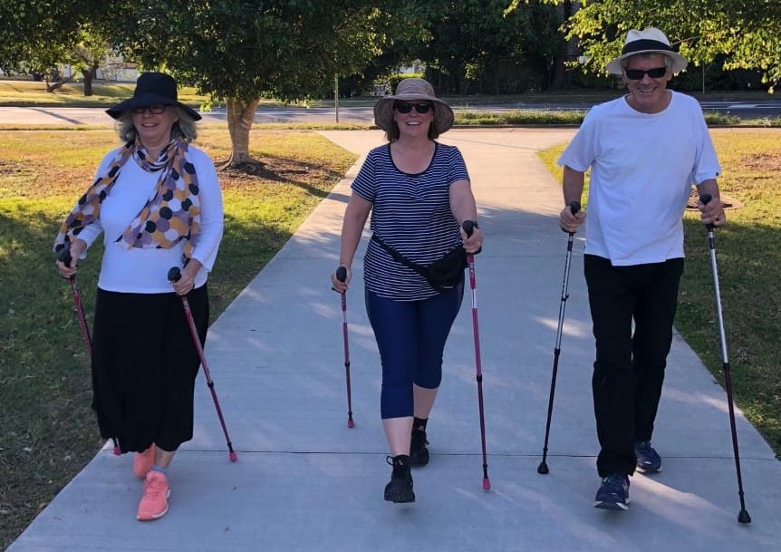 A senior walking with a cane